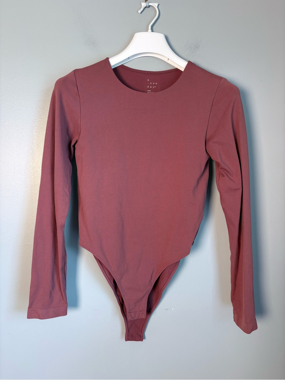 A New Day Mauve Long Sleeve Crewneck Bodysuit Size Large Snap Closure Stretch